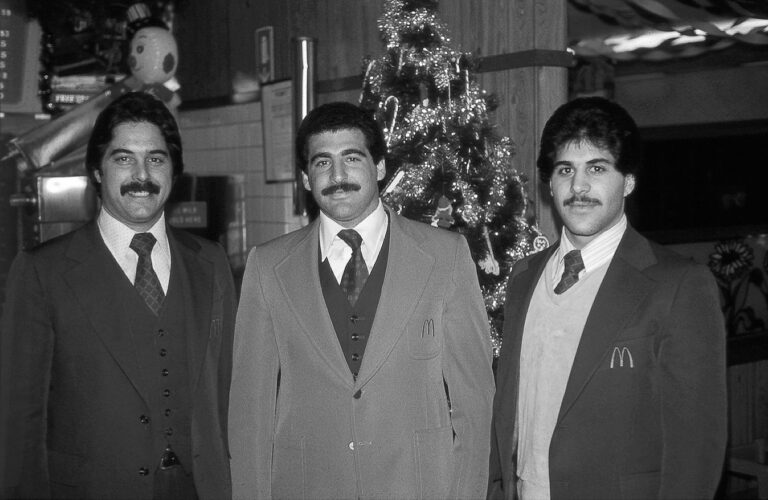 Art Falcone, right, joins his brother, Ed, in the McDonald’s management training program in the late 1970s.