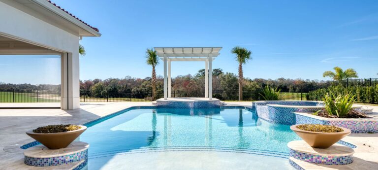 Private backyard pool with trellis and golf course view at a luxury resort home at The Bear’s Den Resort Orlando