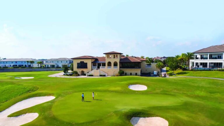 Aerial view of people on the putting green of the Jack Nicklaus Signature Golf Course at The Bear’s Den Resort Orlando