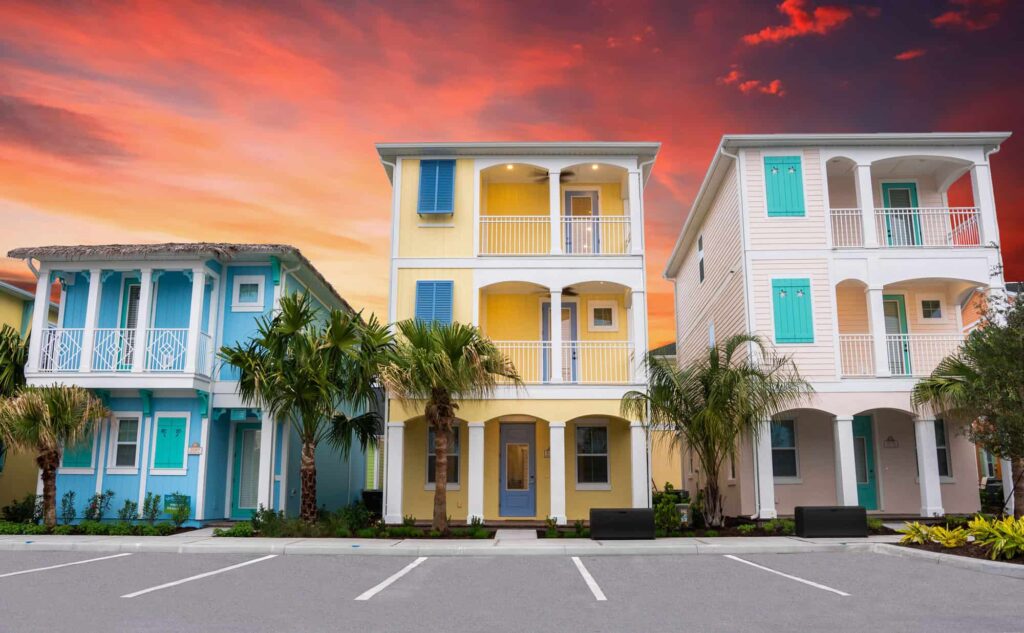 Row of colorful cottages at sunset at Margaritaville Resort Orlando