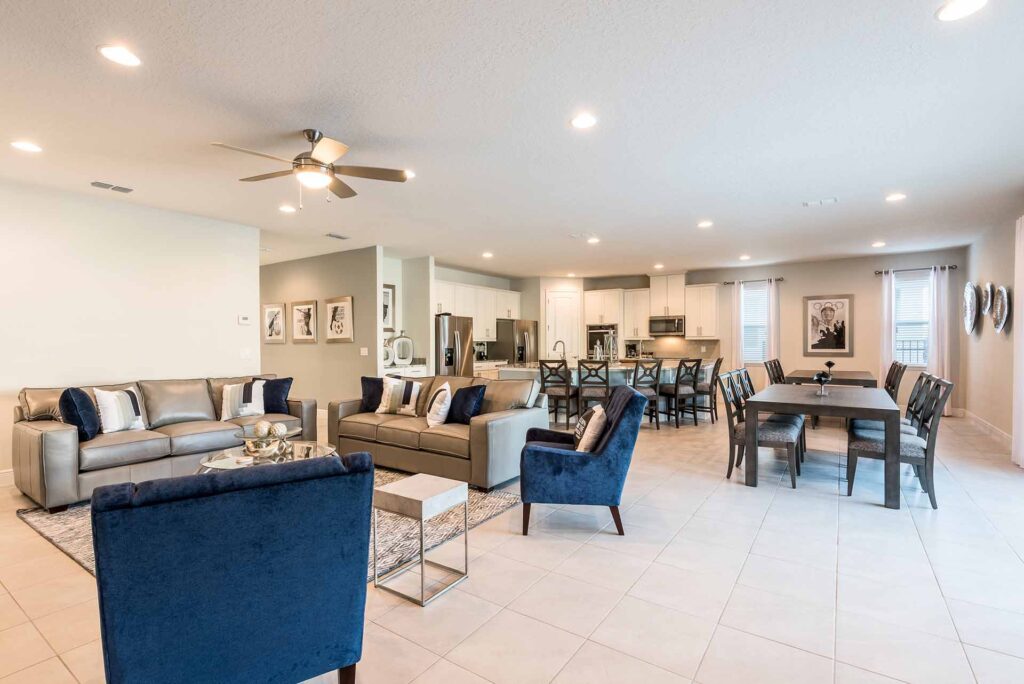 Spacious living, dining, and kitchen area inside an Encore Resort at Reunion vacation home