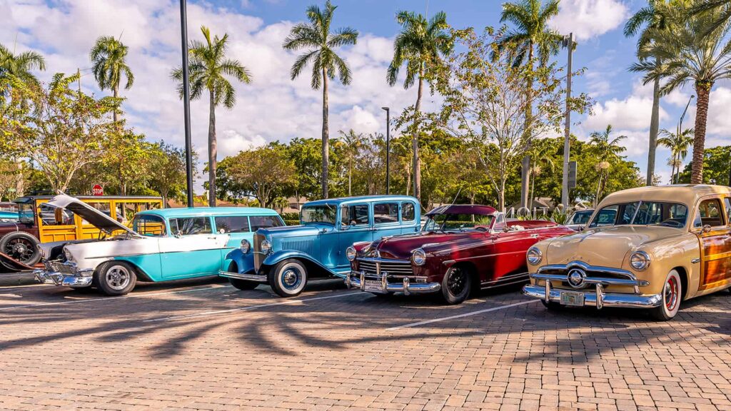 Row of classic cars at a car and truck show at Plantation Walk