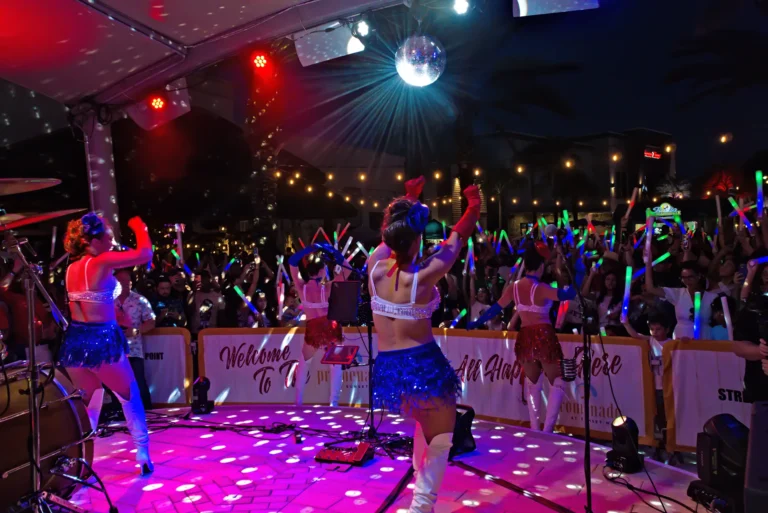 Dancers performing on the Promenade Plaza Stage at Sunset Walk